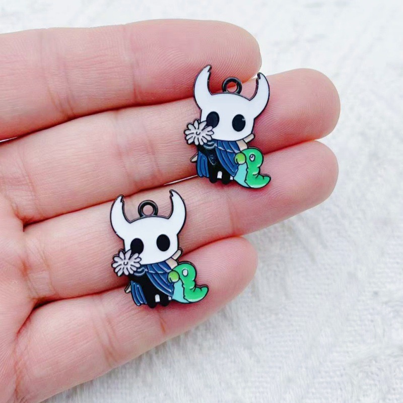 10pcs alloy drip oil cartoon a - Earrings 评论和价格